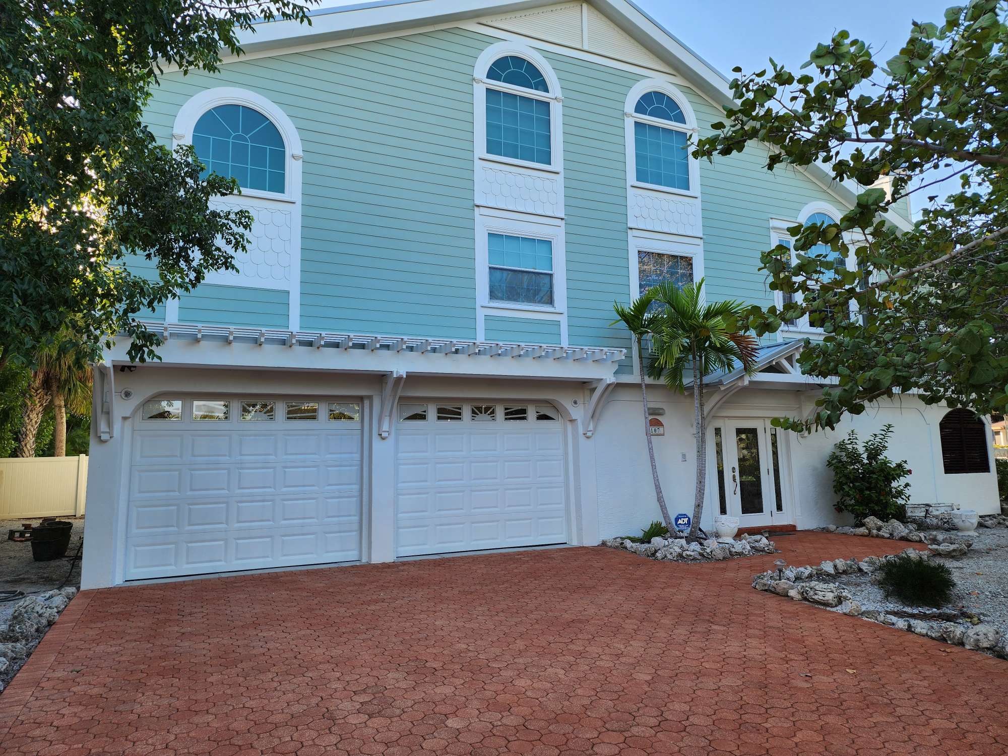 Exterior house painting project in Holmes Beach